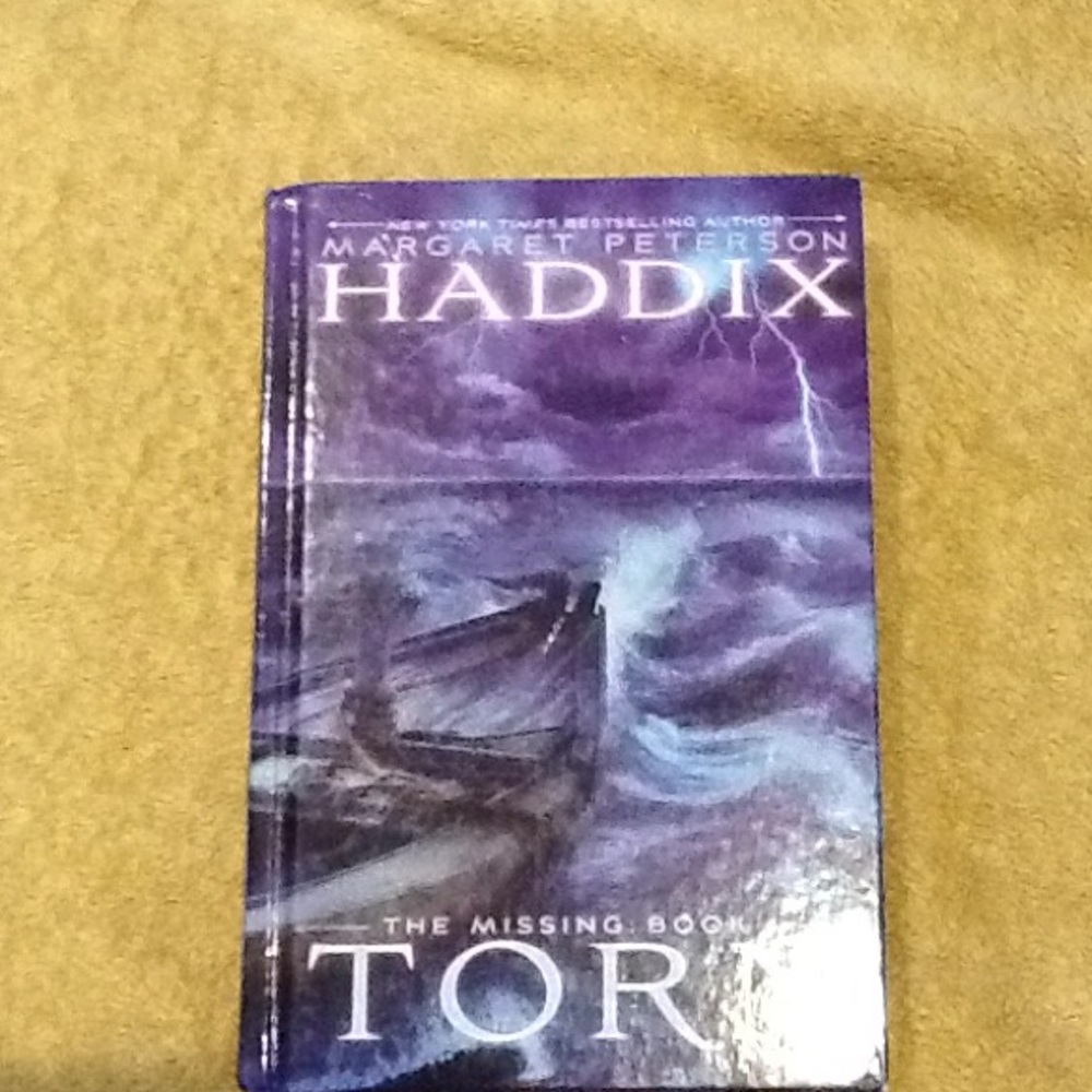 Haddix Torn book #4   By Margaret Peterson